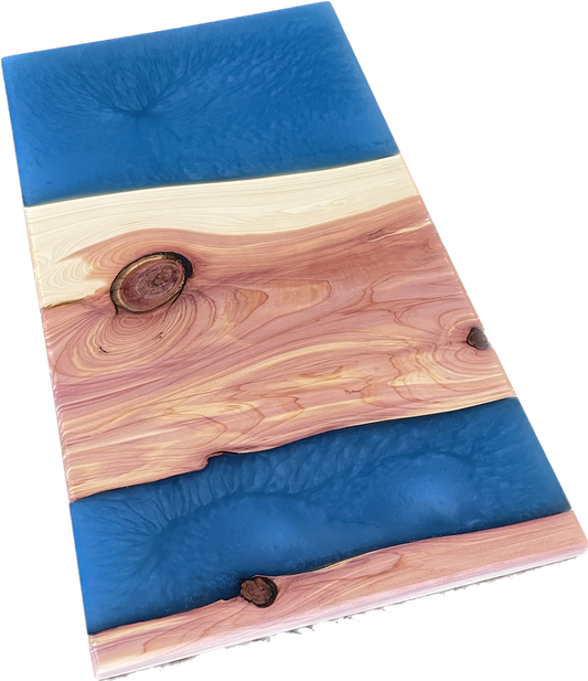 Aromatic cedar charcuterie board with blue epoxy