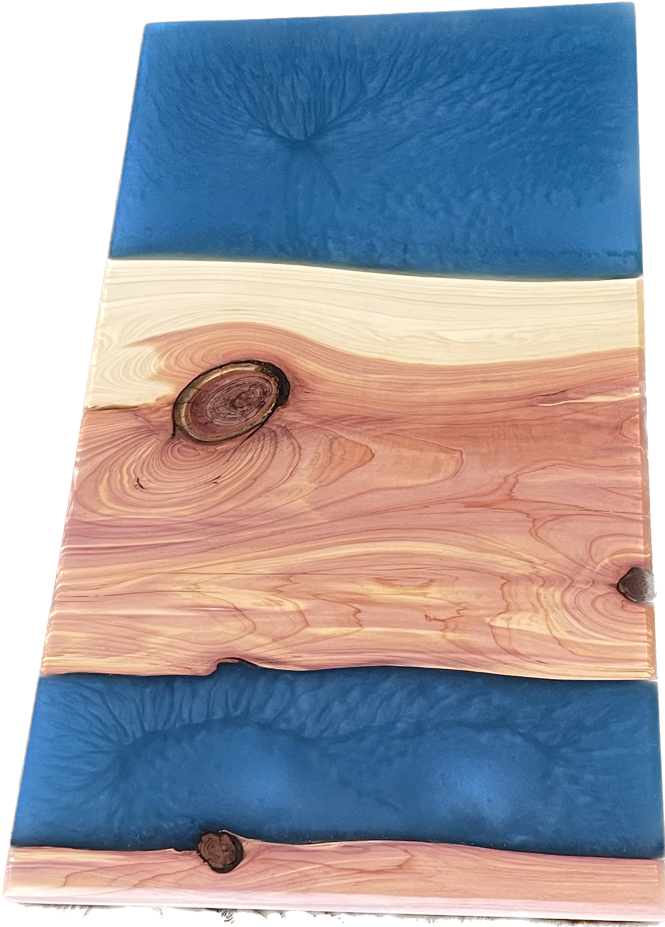 Aromatic cedar charcuterie board with blue epoxy